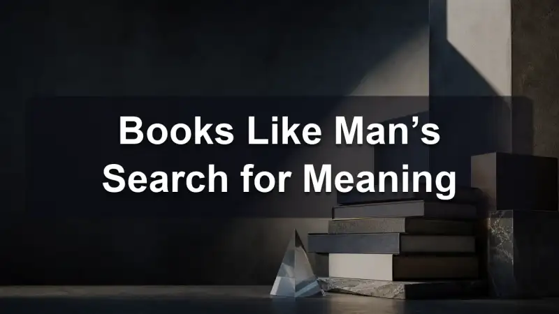 A stack of books about meaning and purpose with a lit candle beside them
